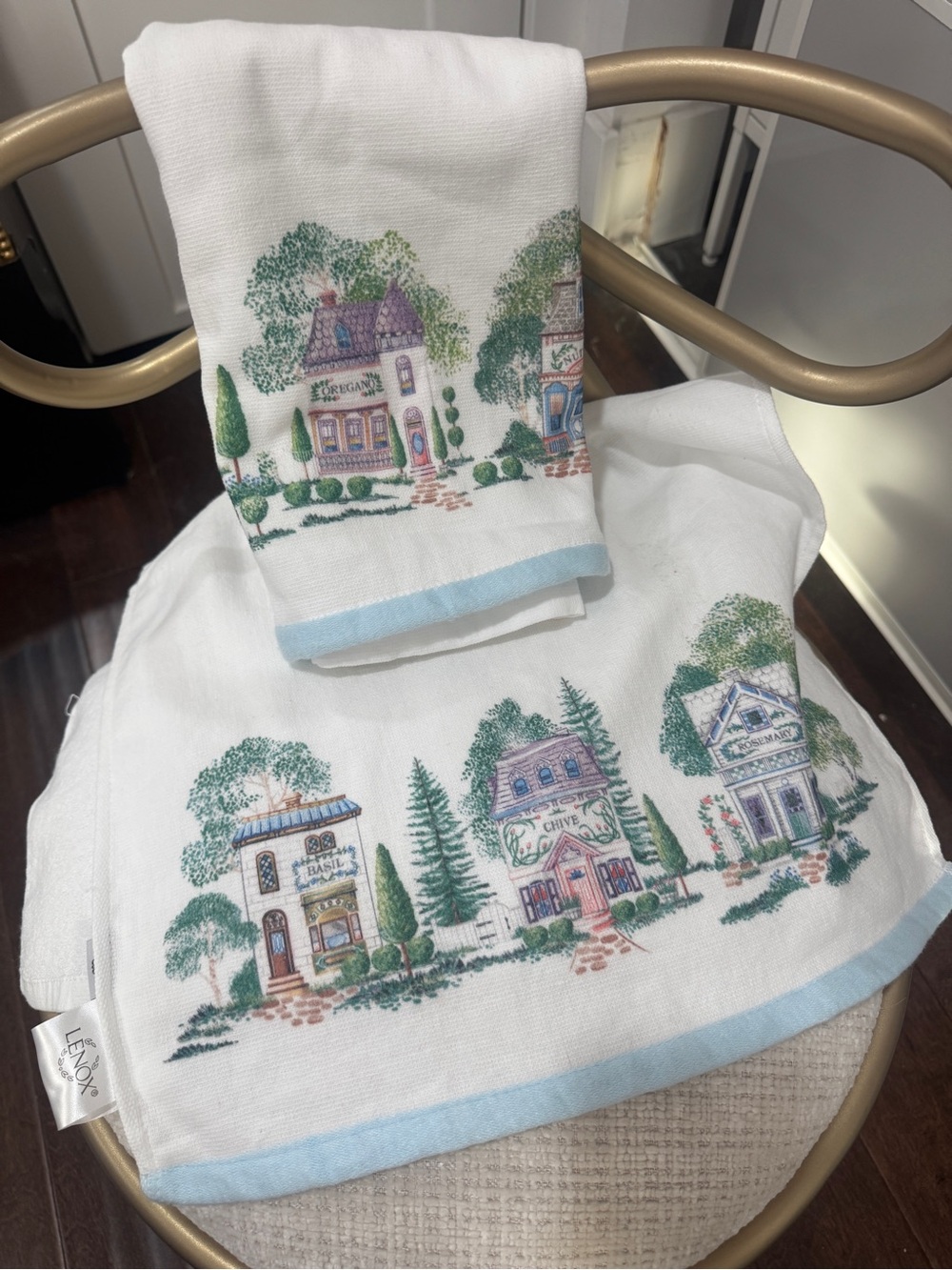 Lenox White Cotton Kitchen Towels with Pastel Village Motif and Light Blue Trim